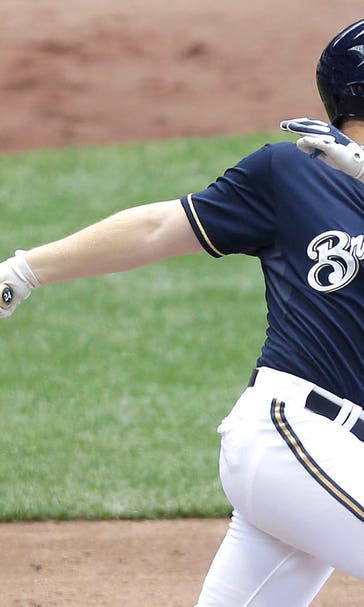 Brewers exercise 2016 option on Lind